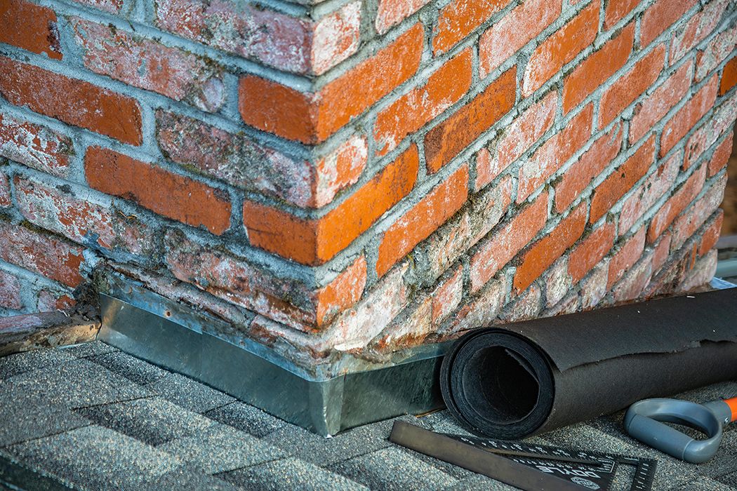 Roof repair for flashing failure and shingle damage